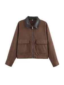 Brown corduroy jacket with contrast leather collar, front zipper, and dual pockets for women.