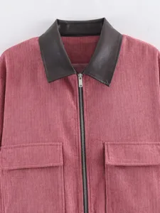 Pink corduroy jacket featuring contrasting leather lapel, front zipper and double pockets.