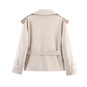 Detail view of women short trench coat back, lapel collar and belted design, elegant style.