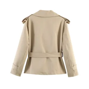 Back detail view of the classic beige short trench coat featuring lapel and belt.