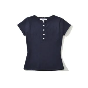 Navy knit short sleeve top detail featuring front buttons and delicate hollow pattern design