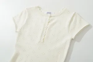 Knit short sleeve top detail view, breathable button front hollow out design for women summer wear.
