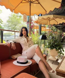 Elegant polka dot lounge set detail shot, featuring stylish patterned top and matching pants.