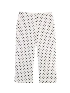 Detailed view of women's mid-waist black and white polka dot casual pants for elegant style.