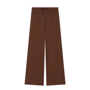 Close-up detail of women's brown wide-leg trousers featuring an adjustable drawstring waist.