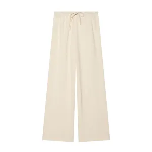 Details of women summer casual beige drawstring wide leg trousers, elegant basic style.
