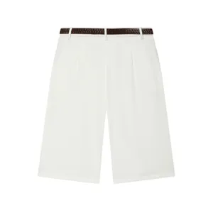 Detailed view of women's white pleated shorts featuring a stylish brown textured belt.