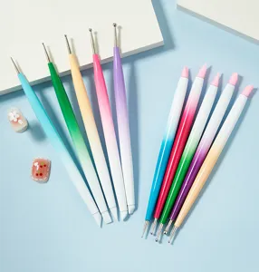 Dual-ended silicone nail art brush and dotting pen set details, colorful gradient handle.