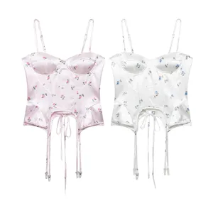Detailed view of the floral print corset top with boning, adjustable straps, and lace-up front.