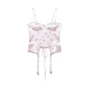 Floral print satin corset top with boning, adjustable straps and playful hem details.