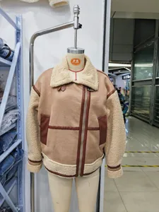 Detail view of the shearling moto jacket showcasing texture, lapel design, and stitching.