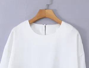 Solid white long sleeve blouse for women, elegant round neck design, casual daily wear style.
