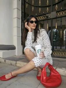 Chic European style women polka dot top and pants set fashion elegant outfit for spring season.