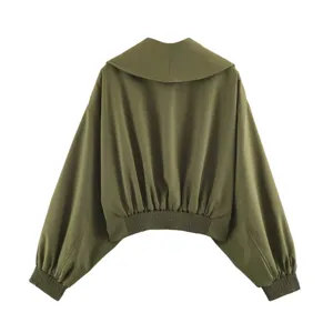 Retro green cropped jacket for women, featuring a wide lapel, lantern sleeves, and elastic hem.