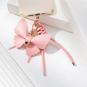 Colgante de teléfono mariposa de cuero rosa lindo lazo correa corta anticaída para funda