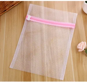 White mesh laundry bag with pink zipper, durable coarse mesh for underwear bra protection.