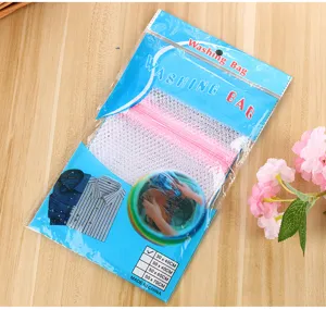 Pink coarse mesh polyester laundry bag for bra and underwear, durable washing bag with zipper.