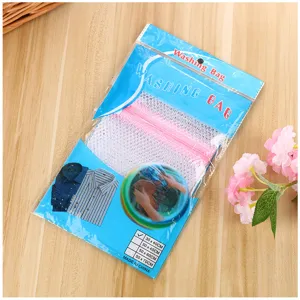Pink coarse mesh square washing bag for underwear and bras with durable zipper closure.