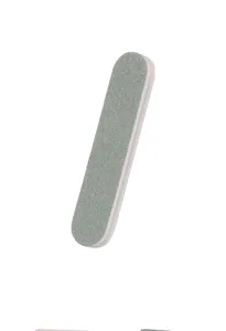 Close-up detail of a double-sided sponge nail file, showing fine abrasive texture.
