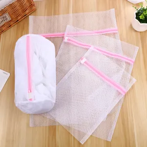 Pink mesh laundry bag set 4-piece cylindrical and square washing bags with zipper top view