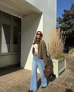 Stylish women's suede zip jacket, casual batwing sleeve outerwear for spring fashion.