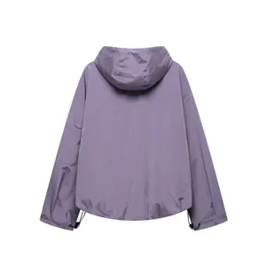 Back detail view of purple outdoor hooded windbreaker jacket with adjustable drawstring hem.