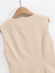 Elegant women's sleeveless slim-fit suit vest detail view, premium tailored fabric.