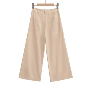 Back view detail of women's casual beige high-waisted wide-leg trousers, elegant and stylish.
