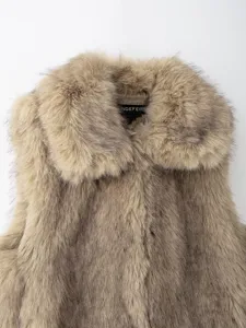 Close-up detail of women's fluffy faux fur vest collar, soft texture and stylish design.