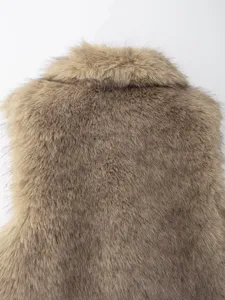 Close-up detail shot of the brown faux fur vest back collar, soft plush texture design.