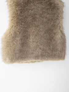 Faux fur short vest detail view, stylish autumn outerwear piece showing soft texture.