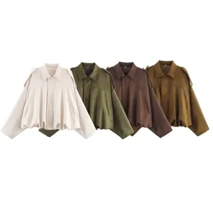 Detailed view of the stylish faux suede bomber jacket, featuring lapel collar and gathered hem.