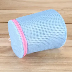 Cylindrical laundry mesh bag with pink zipper for underwear and bra washing protection.