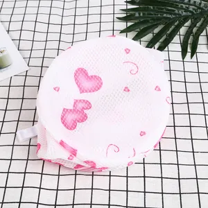 Thickened mesh laundry bag with pink hearts for underwear, durable zipper washing machine pouch.