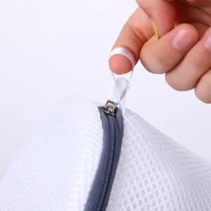Mesh bra laundry bag detail showing durable zipper and fine sandwich mesh fabric.