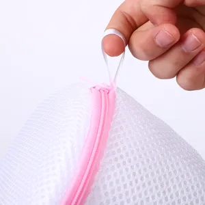 White mesh bra laundry bag with pink zipper, anti-tangle protection pouch for delicate washing.