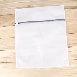 White mesh laundry bag with zipper for clothes washing protection and bra care use.
