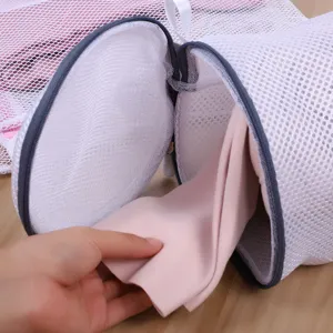 Cylinder mesh bra laundry bag detail showing durable zipper and breathable fabric design.