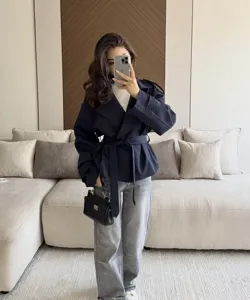 Women short navy blue trench coat with belt, stylish casual commuter lapel outerwear for spring.
