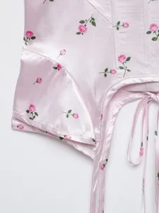 Pink satin floral corset top detail, chic rose print summer cami with boning design.