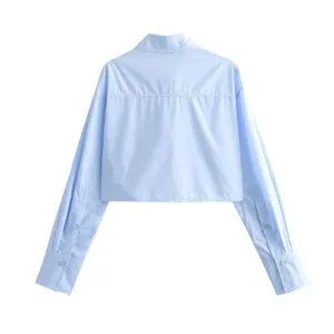 Light blue cropped long-sleeve shirt back view, solid color basic button-down top for women.