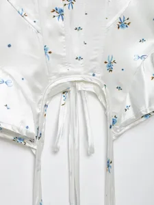 White floral satin boned camisole top with lace-up ties and irregular hem for summer.