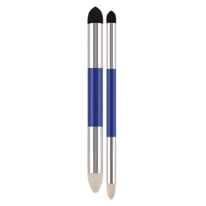 Detail view of dual-ended sketch blending pen set with metallic blue handle and sponge tips.