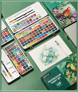 Draagbare vaste aquarelverfset met metalen doos en penseel voor kunstenaarsdetailweergave.