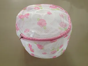 Fine mesh laundry bag with pink rose print, cylindrical bra washing bag for delicate underwear.