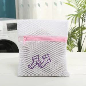 Thickened double-layer mesh laundry bag with pink zipper and sock embroidery for clothes protection.