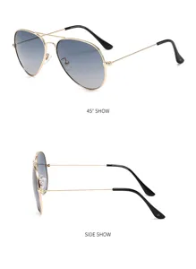 Detail view of classic metal aviator sunglasses with gradient lenses and slim double bridge.