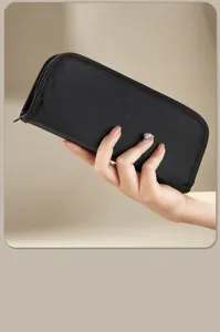 Black canvas pencil case and brush storage bag, durable zipper design for art painting tools.