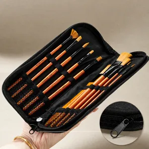 10-piece orange handle nylon paintbrush set with black canvas storage case for art painting.