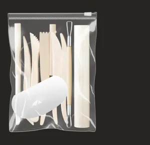 Details view of the 10-piece wooden pottery clay sculpting tools set in a transparent bag.
